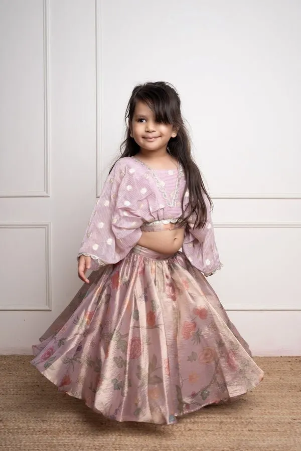 Elegant light Lavender top with white floral embroidery paired with a floral patterned pink lehenga for festive charm