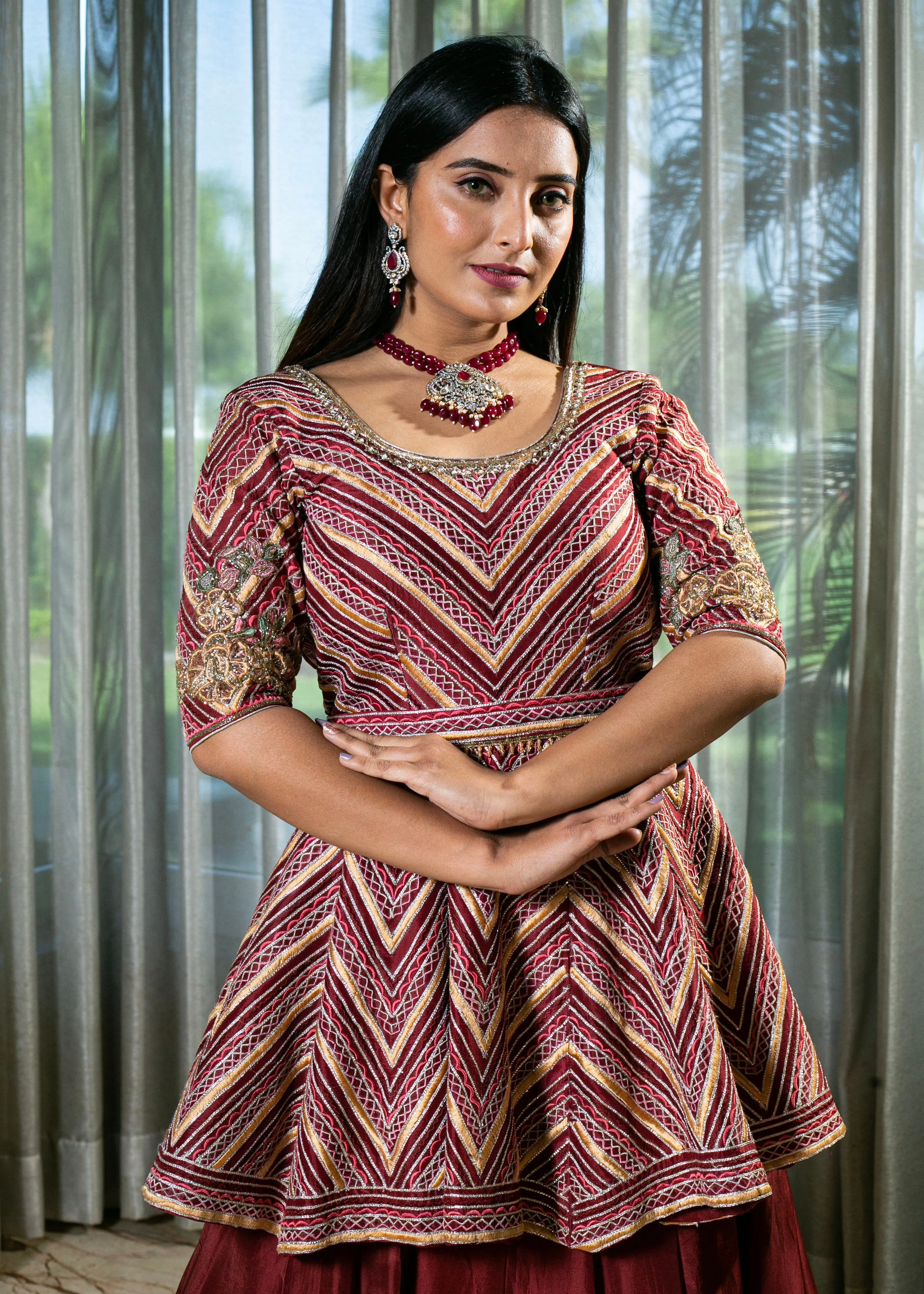 Flared Maroon Silk Lehenga with Intricate Embroidery and Handcrafted Details