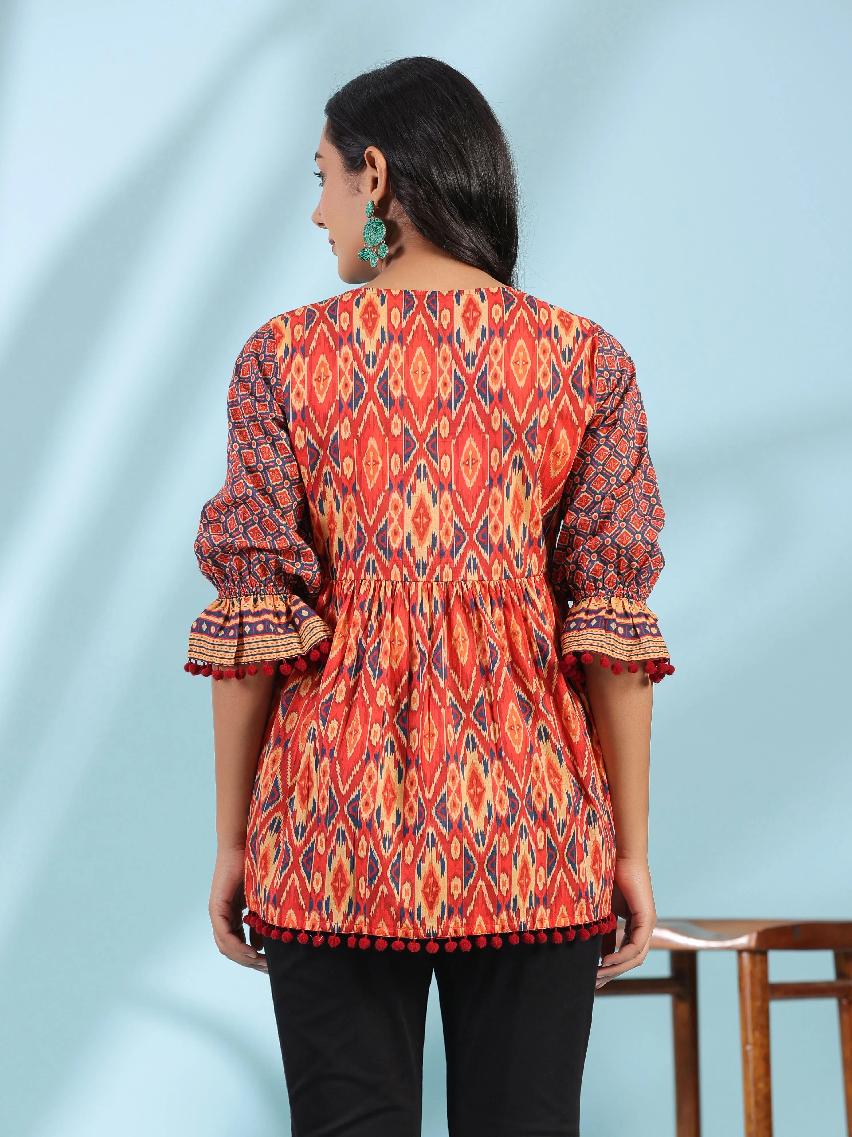 Juniper Orange Ikat Printed Peplum Cotton Tunic With Mirror Work & Lace