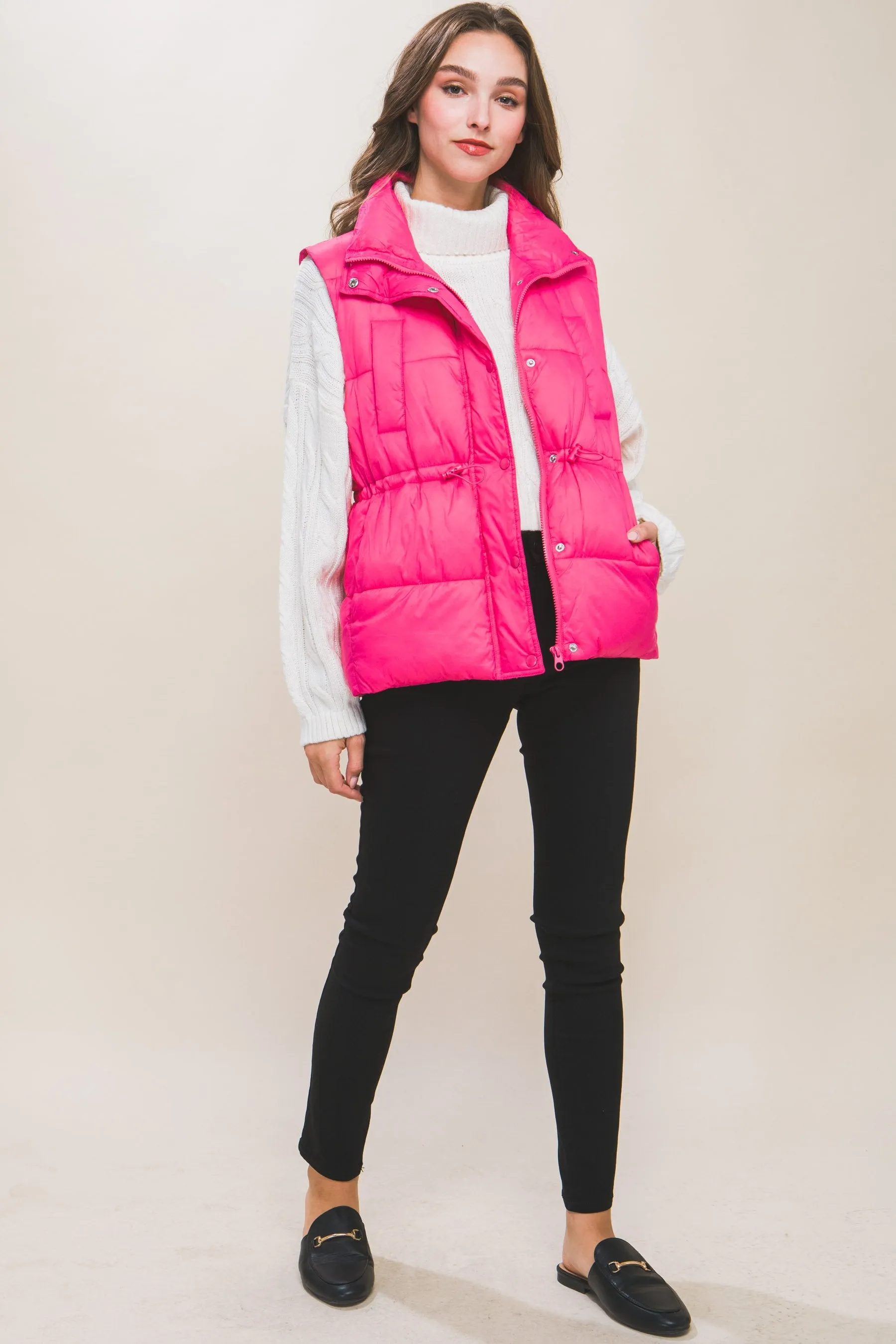 Women's Color Zip up button puffer vest with waist toggles